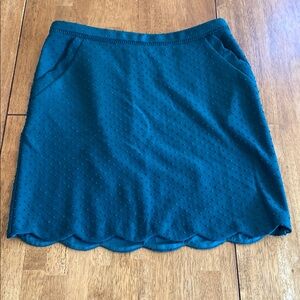 Green scallop edged skirt